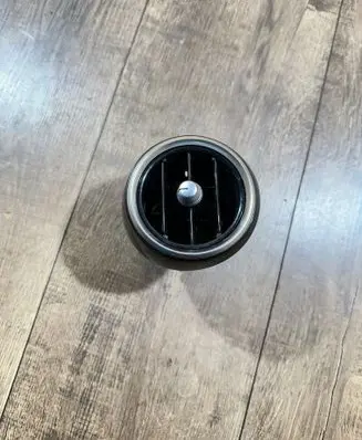 Dash center air vent grill