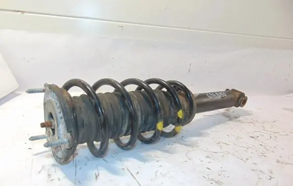 Front shock absorber with coil spring