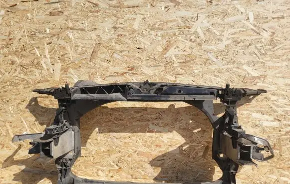 Radiator support slam panel