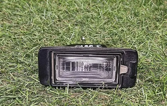 Opel Zafira C Number plate light 13578958