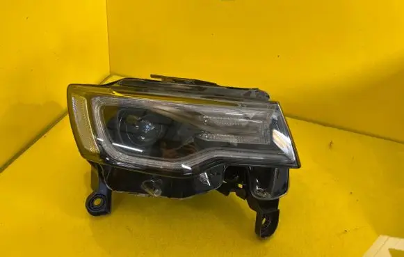 Jeep Grand Cherokee Headlight/headlamp T77598B