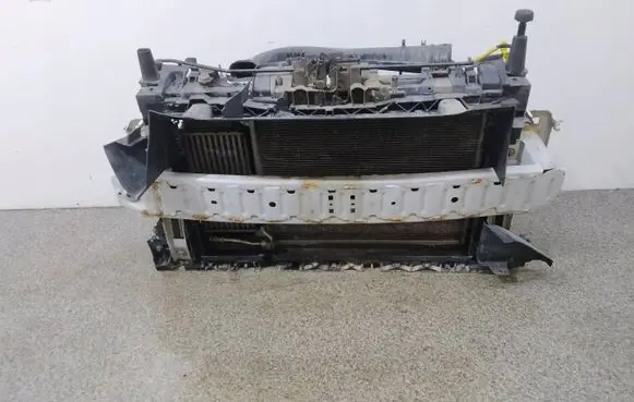 Radiator support slam panel