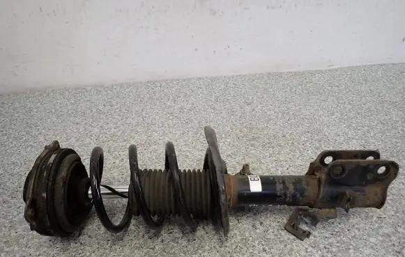 Nissan Pulsar Front shock absorber with coil spring