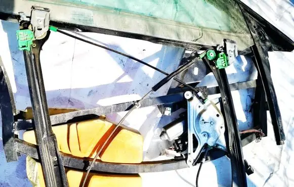 Sliding door window regulator with motor