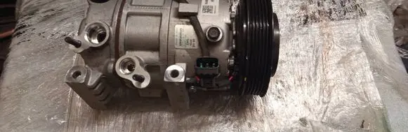 Hyundai Tucson TL Air conditioning (A/C) compressor (pump) 97701D7600