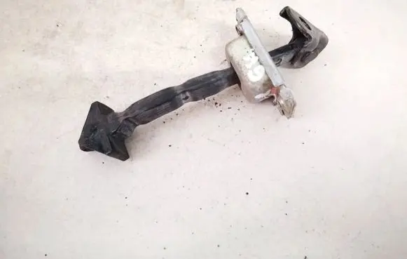 Subaru Legacy Rear door check strap stopper