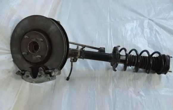 Front shock absorber/damper