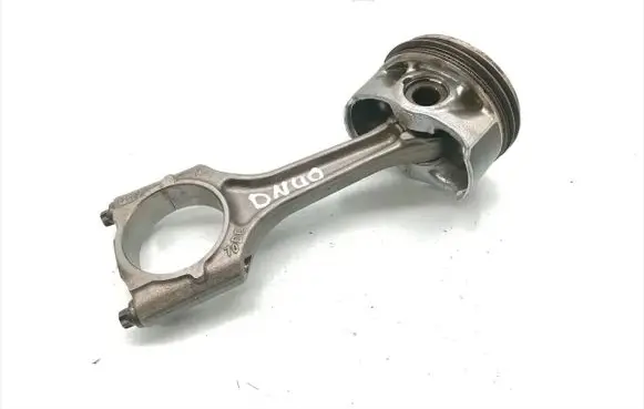 Piston with connecting rod