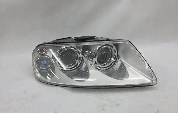 Volkswagen Touareg I Headlight/headlamp 7L6941016BK