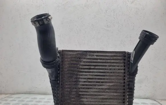 Volkswagen Touareg I Intercooler radiator 7L6145804