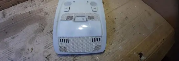 Headlining lighting console trim