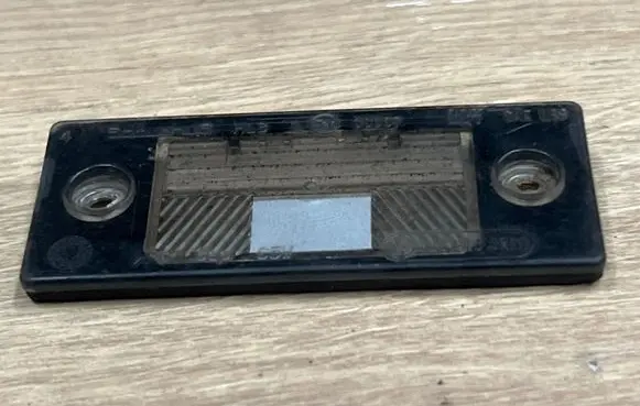 Volkswagen Touareg I Number plate light 1J5943021A