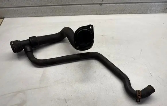 Volkswagen PASSAT B5 Engine coolant pipe/hose 8D0121055F