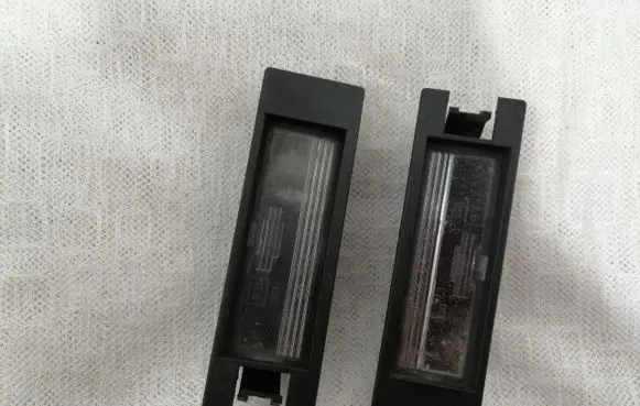 Opel Zafira B Number plate light 0461200
