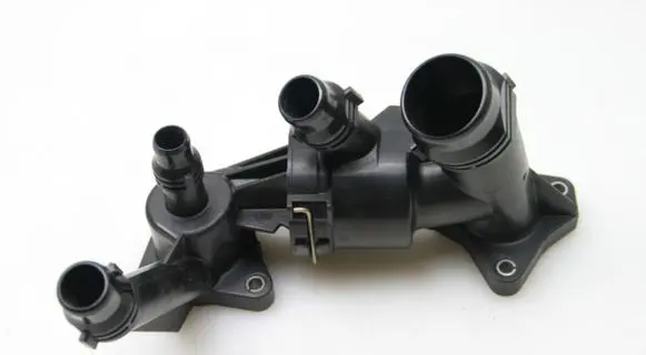 Thermostat/thermostat housing