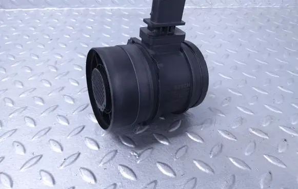 BMW 1 E81 E87 Mass air flow meter 7788743 0281002567