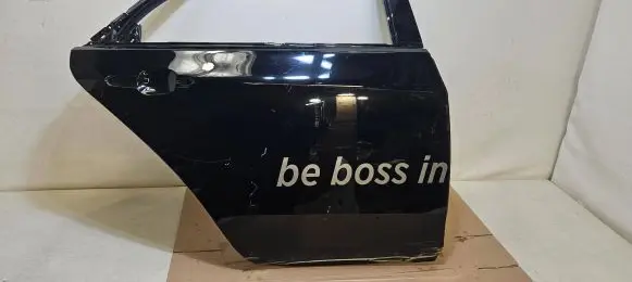 Cadillac CTS Rear door