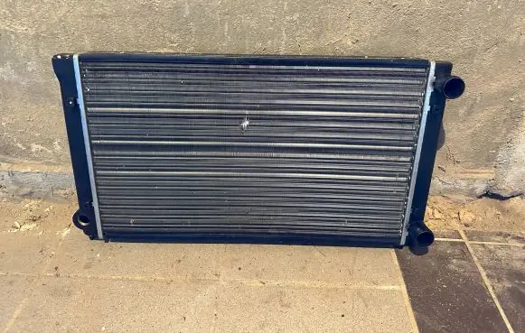 Volkswagen PASSAT B4 Coolant radiator 353121253AC
