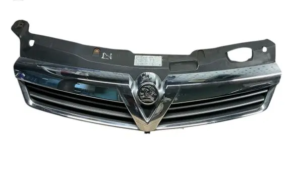 Opel Astra H Front bumper upper radiator grill 13225788 13225789