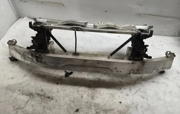 Top upper radiator support slam panel