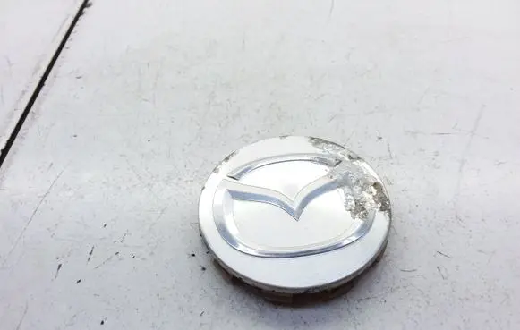 Mazda 626 R12 wheel hub/cap/trim YL841A096CA GD7F3719X