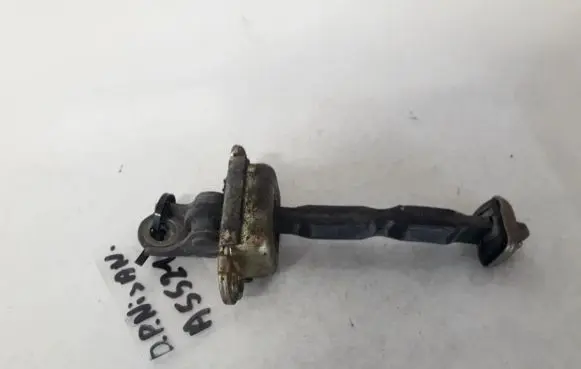 Front door check strap stopper