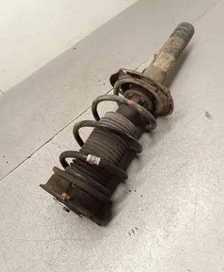 Front shock absorber with coil spring