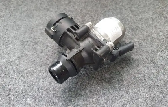 Coolant heater control valve