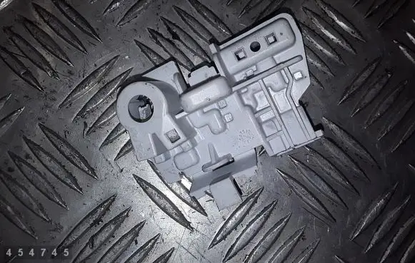 Tail light bulb cover holder
