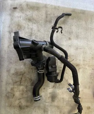 Thermostat/thermostat housing