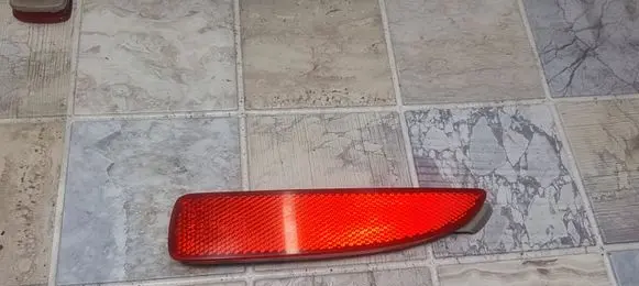 Rear tail light reflector