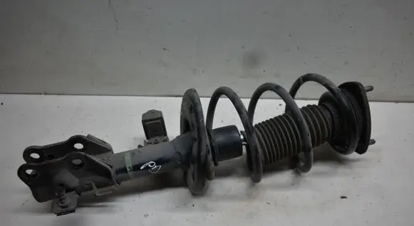 Mazda 3 II Front shock absorber with coil spring