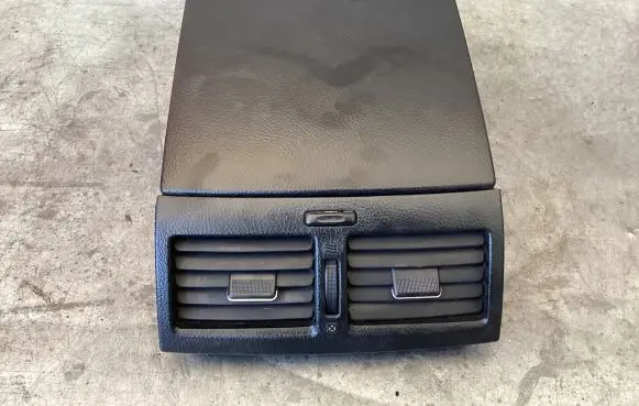 Dash center air vent grill