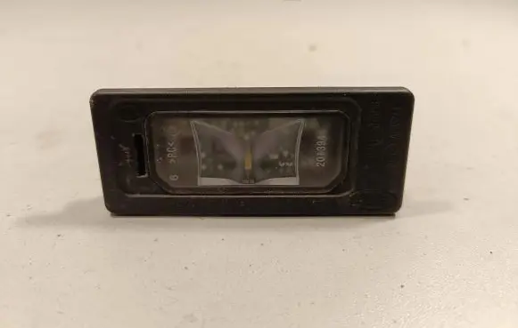 Jaguar XF X260 Number plate light GX7313B627AB