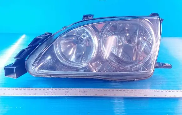 Toyota Avensis T220 Headlight/headlamp 54534381