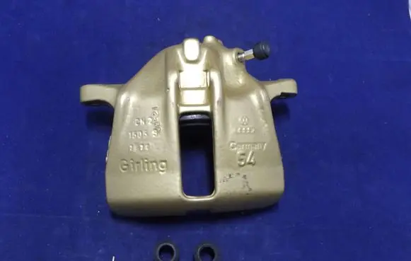Volkswagen Golf III Front brake caliper 50994 357615123A UBD