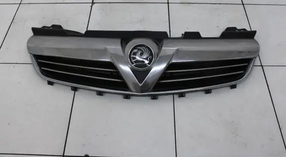 Opel Zafira B Front bumper upper radiator grill 13247327