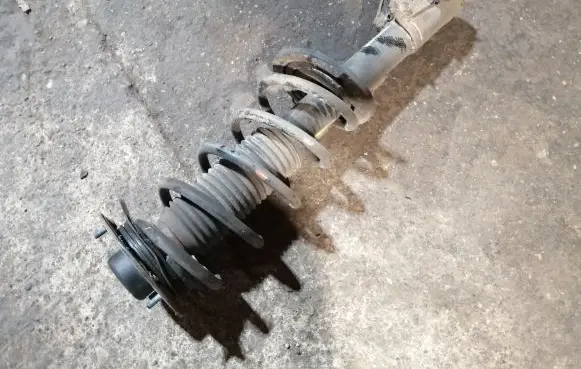 Front shock absorber with coil spring