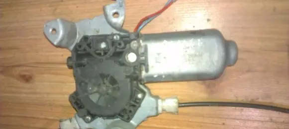 Nissan Primera Front door window regulator motor 112440