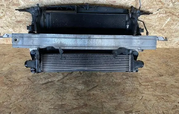 Radiator support slam panel