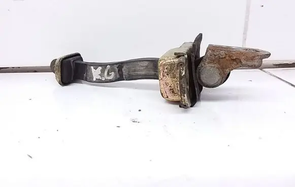Nissan Primera Rear door check strap stopper