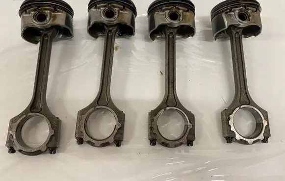 Piston with connecting rod