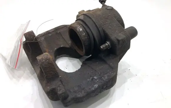 Volkswagen Touareg I Front brake caliper 
