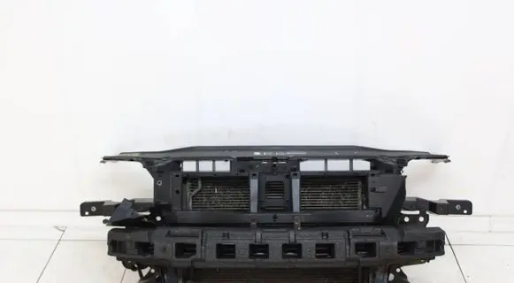 Radiator support slam panel