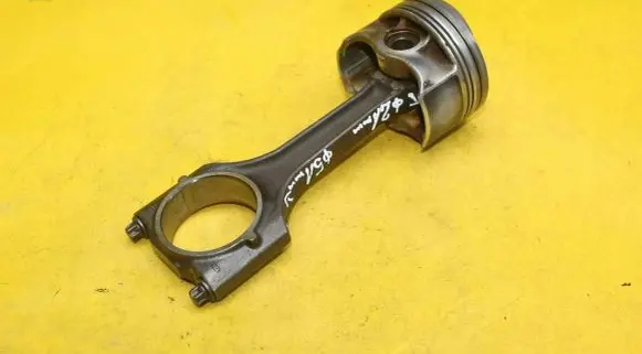Piston with connecting rod