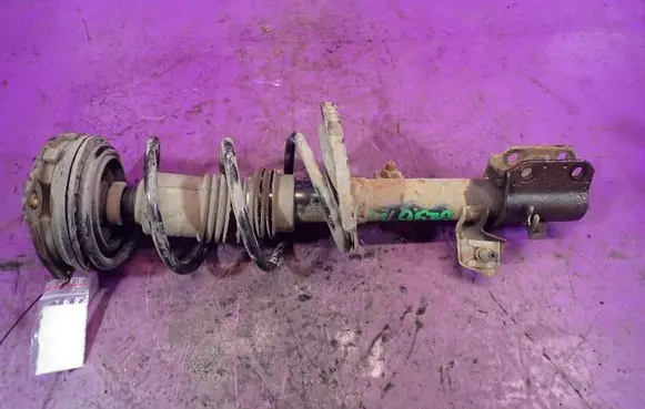 Nissan Micra Front shock absorber with coil spring 