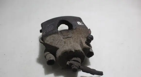 Volkswagen Golf VI Front brake caliper
