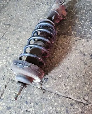 Nissan Primastar Front shock absorber with coil spring 93860763