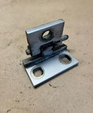 Rear door upper hinge