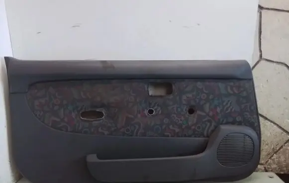 Nissan Micra Front door card panel trim